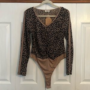 NWT Body suit size L